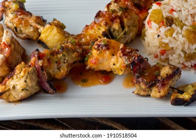 Chicken Kabobs. Cubes Of Grilled Chicken, Grilled Vegetables, Onions Bell Peppers And Seasoned With Garlic And Spices. Served With Rice, Traditional Classic Greek Or Italian Restaurant Favorite. 