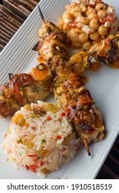 Chicken Kabobs. Cubes Of Grilled Chicken, Grilled Vegetables, Onions Bell Peppers And Seasoned With Garlic And Spices. Served With Rice, Traditional Classic Greek Or Italian Restaurant Favorite. 