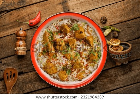 Chicken kabsa - homemade arabian rice, top view
                  