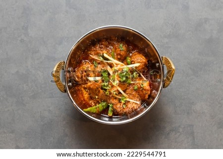Chicken karahi korma msala served in dish isolated on table top view of asian and indian food
