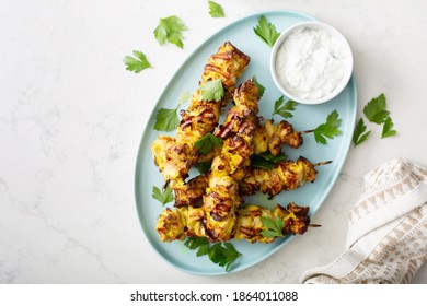 Chicken Kebab Yogurt Marinated With Tzatziki Sauce And Vegetable Salad