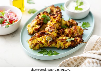 Chicken Kebab Yogurt Marinated With Tzatziki Sauce And Vegetable Salad