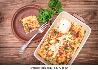 Chicken Lasagna And White Cheese .