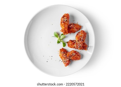 Chicken Legs In Batter With Sesame Seeds, Sauce And Mung Bean Salad In A Plate On A White Background