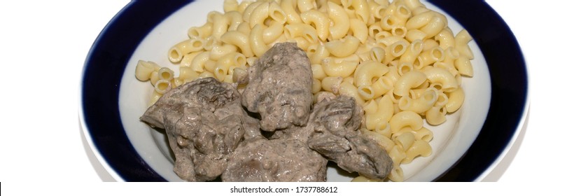 Chicken Liver Stewed In Sour Cream And A Side Dish Of Pasta In A Bowl On A White Background, Close-up. Healthy Food, Menu Concept Background