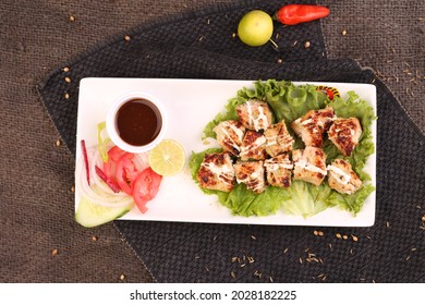 Chicken Malai Boti with background