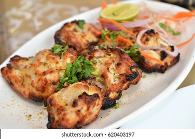 Chicken Malai Tikka Boneless piece, Indian dish.