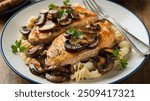 Chicken Marsala:
Pan-seared chicken in a rich, sweet Marsala wine sauce with mushrooms, an Italian-American classic.