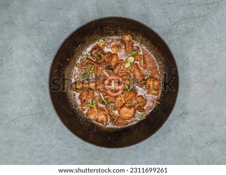 Chicken namkeen karahi korma masala served in dish isolated on background top view of indian spices and pakistani food