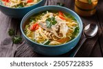 Chicken Noodle Soup: Comforting broth with tender chicken, noodles, and vegetables, perfect for a warming, homey meal