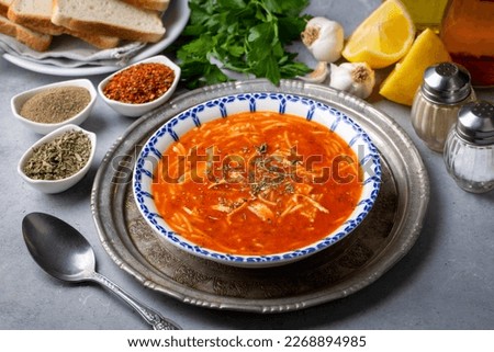 Chicken noodle soup with tomato. Turkish name; Domatesli tavuklu sehriye corbasi