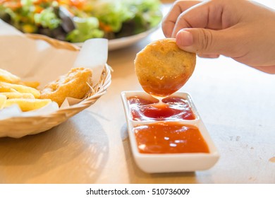 Chicken Nugget Dipping In Sauce