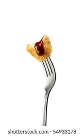 Chicken Nugget In A Fork With Bbq Sauce