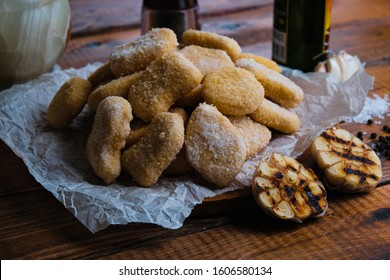 chicken nuggets composition on a wooden background