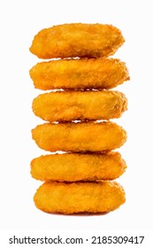Chicken nuggets lie on top of each other on a white background. Vertical orientation