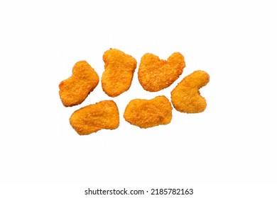 Chicken nuggets on a white plate. Horizontal orientation