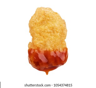Chicken Nuggets in tomato sauce on a white background - Shutterstock ID 1054374815