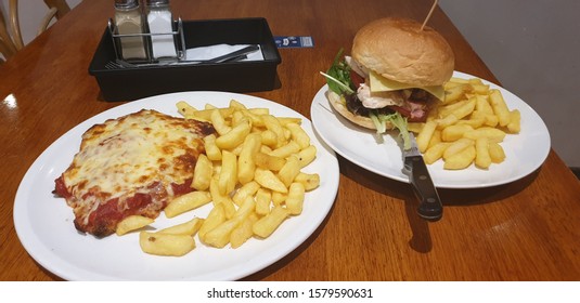 Chicken Parma And Gourmet Burger With Chips