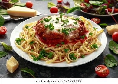 Chicken Parmesan With Cheese And Marinara Sauce Served Over Spaghetti, Pasta