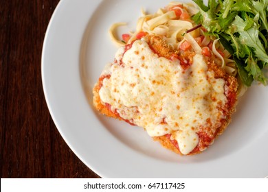 Chicken Parmigiana With Cheese And Pasta