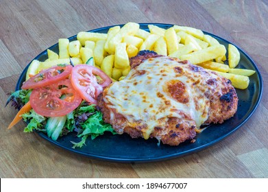 Chicken Parmigiana With Chips And Salad