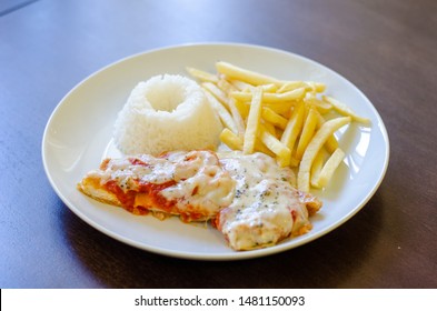 Chicken Parmigiana File With White Rice And Chips