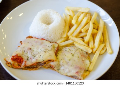 Chicken Parmigiana File With White Rice And Chips