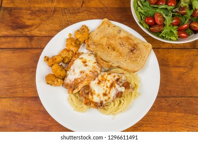 Chicken Parmigiana And Shrimp Scampi Fritta With Garden Salad