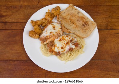 Chicken Parmigiana And Shrimp Scampi Fritta With Garlic Toast And Spaghetti