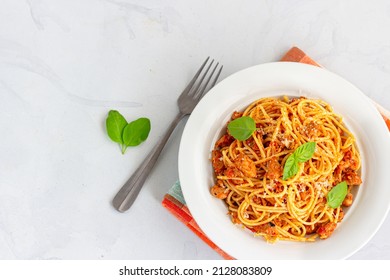 Chicken Pasta With Spaghetti Garnished With Fresh Basil Top Down Photo
