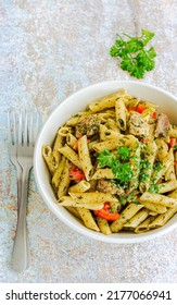 Chicken Pestp Penne Pasta In A Bowl Garnished With Fresh Parsley Leaves Top Down Vertical Italian Food Photo