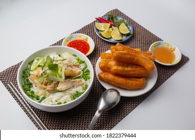 Chicken Pho Or Pho Ga On A Table Kitchen In Hanoi, Vietnam. Including Chicken, Fresh Rice Noodle, Herb On Broth. Everyday Food In Vietnam And Famous In The World