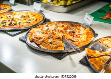 Chicken Pizza Served At A Buffet