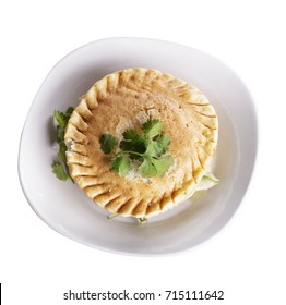 Chicken Pot Pie In A Plate Isolated On White Background