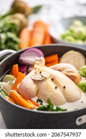 Chicken Ready To Cook Broth With Fresh Root Vegetables And Spices.