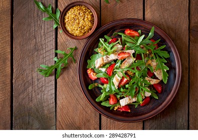 Chicken Salad With Arugula And Strawberries. Top View