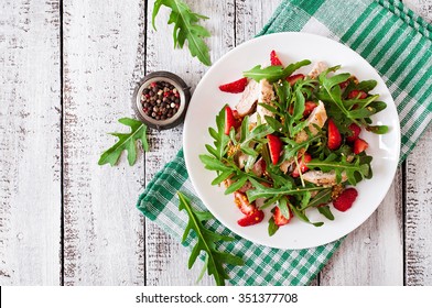 Chicken Salad With Arugula And Strawberries. Top View