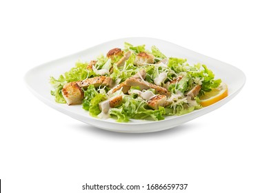 Chicken Salad. Chicken Caesar Salad. Caesar Salad with grilled chicken and croutons. Grilled chicken breast and fresh green salad isolated on white