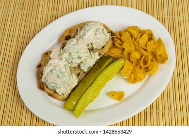 Chicken Salad On Raisin Bread With Chips And Dill Pickle