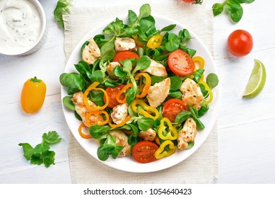 Chicken Salad With Vegetables On White Wooden Table. Top View, Flat Lay