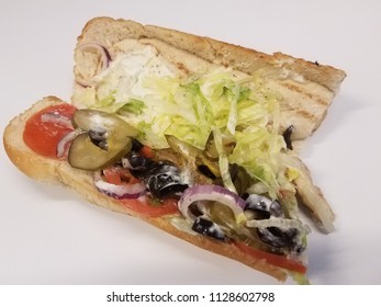 Chicken Sandwhich With Olives, Pickles, Tomato And Lettuce