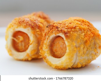 Chicken Sausage Roll Made From Bread With Cheese Sprinkles In Small Bite Size