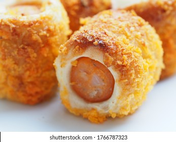 Chicken Sausage Roll Made From Bread With Cheese Sprinkles In Small Bite Size