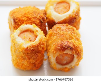 Chicken Sausage Roll Made From Bread With Cheese Sprinkles In Small Bite Size