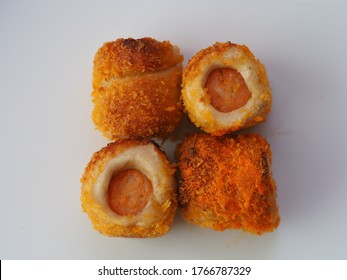 Chicken Sausage Roll Made From Bread With Cheese Sprinkles In Small Bite Size