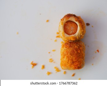 Chicken Sausage Roll Made From Bread With Cheese Sprinkles In Small Bite Size