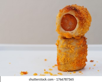 Chicken Sausage Roll Made From Bread With Cheese Sprinkles In Small Bite Size