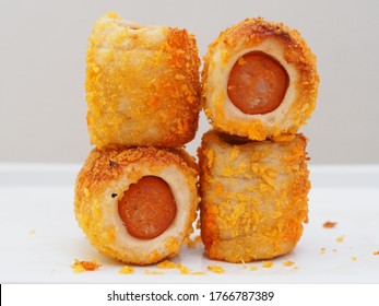 Chicken Sausage Roll Made From Bread With Cheese Sprinkles In Small Bite Size