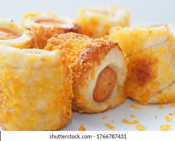 Chicken Sausage Roll Made From Bread With Cheese Sprinkles In Small Bite Size