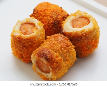 Chicken Sausage Roll Made From Bread With Cheese Sprinkles In Small Bite Size